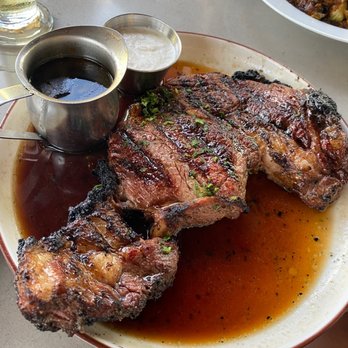 The Cutlery - Prime Rib Cooked Paniolo Style. Way too much Sauce in the Pkate. Would've been better with nothing under it - Steakhouses Near Me - Honolulu, Hawaii