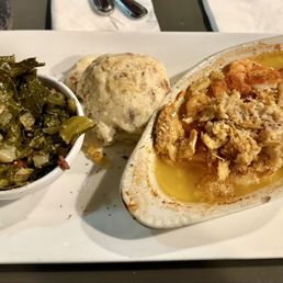 Seafood Trifecta with collard greens and mashed potatoes. Seafood Trifecta with collard greens and mashed potatoes.