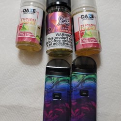 Ryo Tobacco - Two vapes and three juice.