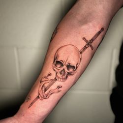 Old Towne Tattoo Parlor - forearm skull tattoo