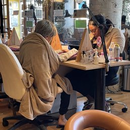 Ambria giving my mom a manicure.