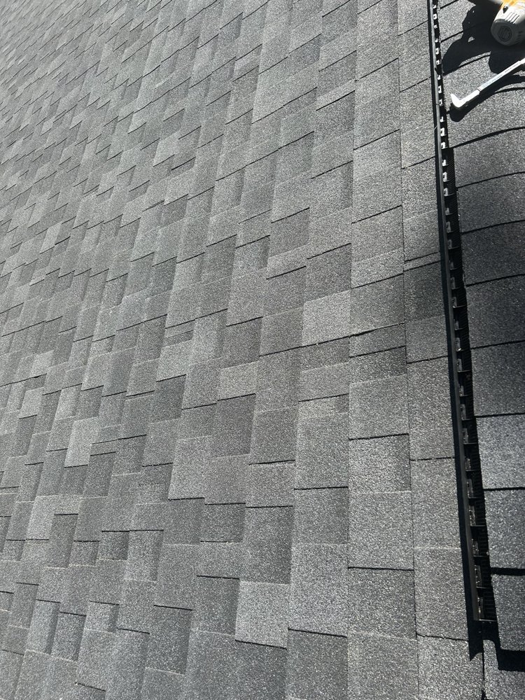 Slide of Monarch Roofing