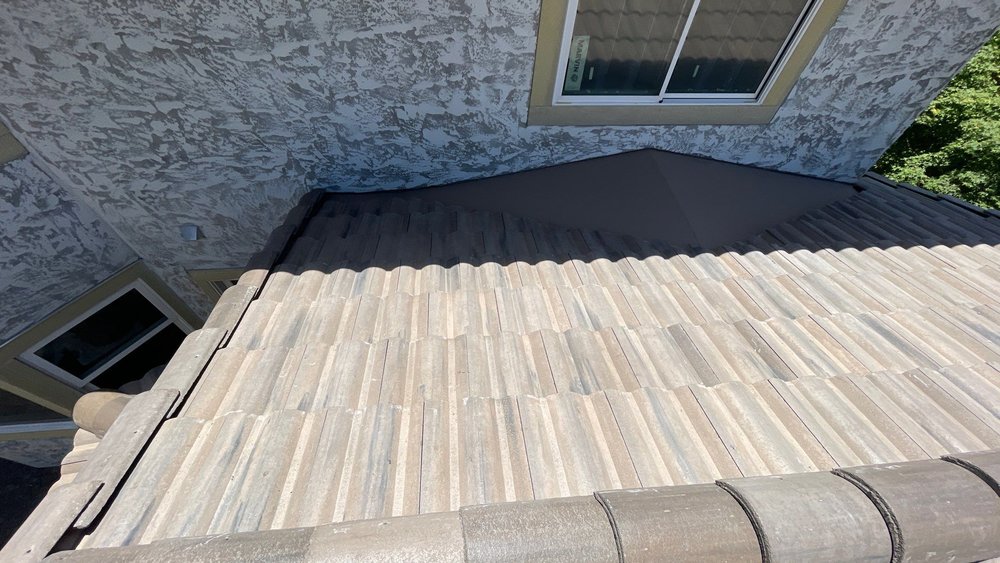 Slide of Assurance Roofing Company