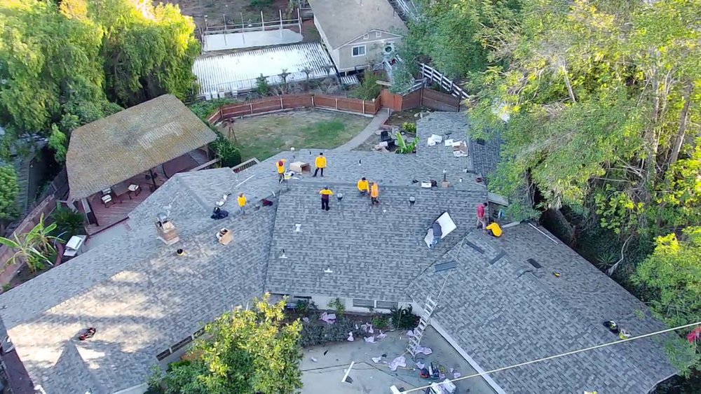 Slide of Queen Roofing