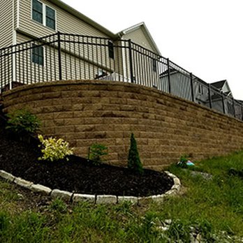 Littles Landscaping - a retaining wall and a fence - Landscaping Near Me - McDonald, Pennsylvania Littles Landscaping - a retaining wall and a fence - Landscaping Near Me - McDonald, Pennsylvania