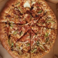 Pizza Hut - Their pathetic attempt at a large stuffed crust pizza with green peppers, onions and grilled chicken.