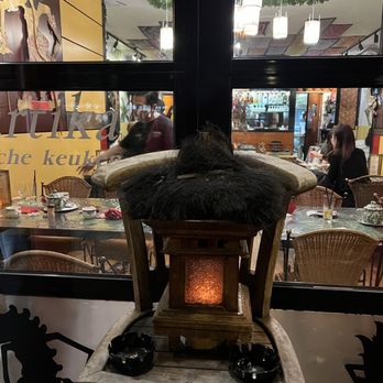 Kartika - Little heater sitting outside Kartika - Indonesian Near Me - Amsterdam, New Hampshire