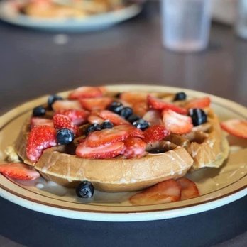 George's Coney and Grill - a plate of waffles with strawberries and blueberries - Greek Near Me - Howell, Michigan