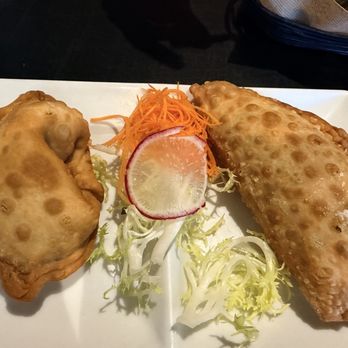 Malbec Argentinean Cuisine - Corn and cheese empanadas (left) Spicy beef empanadas ( right) - Argentine Near Me - Pasadena, California Malbec Argentinean Cuisine - Corn and cheese empanadas (left) Spicy beef empanadas ( right) - Argentine Near Me - Pasadena, California