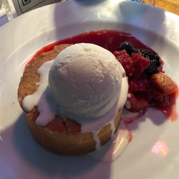 Ocean Prime - WARM BUTTER CAKE  Fresh Berries, Vanilla Ice Cream, Raspberry Sauce - Seafood Near Me - Beverly Hills, California