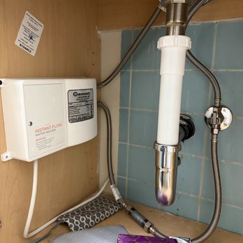 Plumbing Professionals - Point of use tankless water heater installed under the sink in Pasadena California - Plumbing Near Me