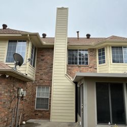 Texas Pride Roofing and Fencing - Completed chimney rebuild in Plano, TX by Texas Pride Roofing & Fencing. New siding installed to match the home, preparing the chimney for a