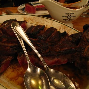 Peter Luger - Porterhouse steak for three with Peter Luger Sauce - Steakhouses Near Me - Brooklyn, New York Peter Luger - Porterhouse steak for three with Peter Luger Sauce - Steakhouses Near Me - Brooklyn, New York