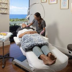 Beautiful You MD Aesthetics - Dr. Sanchez treating a patient in her office.