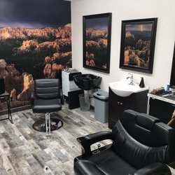 Cliffs Barbershop - Barber chairs and wall art.