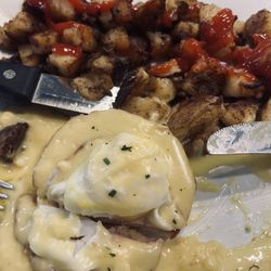 Salty eggs Benedict and cold hasbrowns