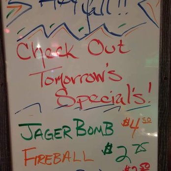 Saddle Up Saloon - a sign for the menu - Bars Near Me - Mishawaka, Indiana