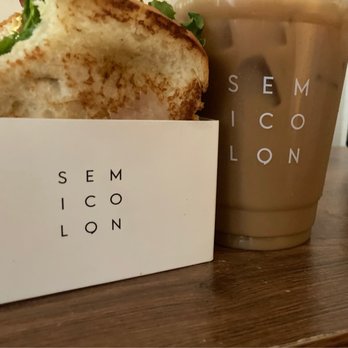 Semicolon Cafe - A bite of the BELT I forgot to take the picture first I'm sorry! It's so good! Iced Coffee - Coffee & Tea Near Me - New York, New York Semicolon Cafe - A bite of the BELT I forgot to take the picture first I'm sorry! It's so good! Iced Coffee - Coffee & Tea Near Me - New York, New York