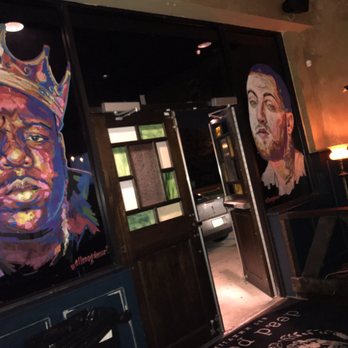 Dead Poet - a painting of a man with a crown on his head - Bars Near Me - Baton Rouge, Louisiana Dead Poet - a painting of a man with a crown on his head - Bars Near Me - Baton Rouge, Louisiana