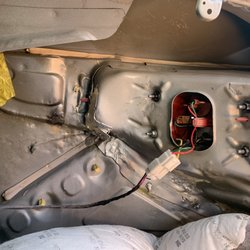 ACE Rent A Car - Burn marks inside trunk sheet metal. Jagged metal pieces.