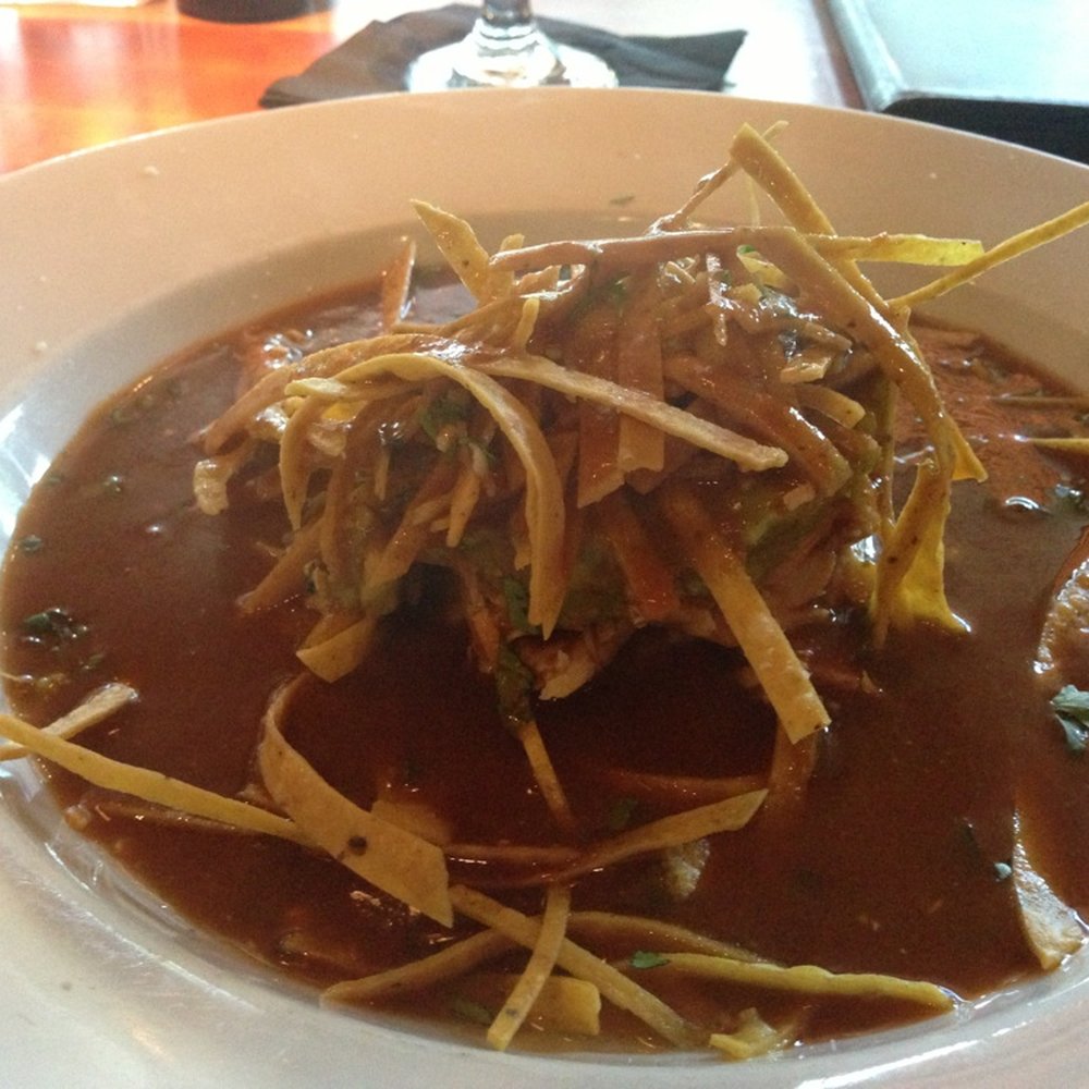 Roaring Fork - Chicken tortilla soup with a stack of guacamole, chicken and strips. Flavorful thick broth. - New American Near Me - Austin, Texas Roaring Fork - Chicken tortilla soup with a stack of guacamole, chicken and strips. Flavorful thick broth. - New American Near Me - Austin, Texas