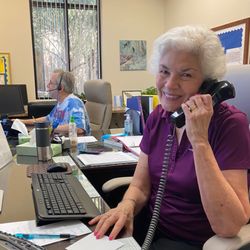 Neighbors Who Care - Volunteers help in the office