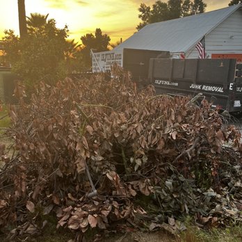 IE Junk - A pile of branches, old poles and picket fence posts. - Junk Removal & Hauling Near Me - Mentone, California