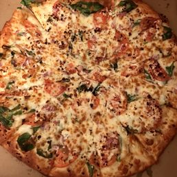 The spinach and feta pizza with white sauce The spinach and feta pizza with white sauce