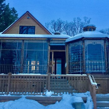 Harbor Awning - Clear vinyl porch roll curtains - Shades & Blinds Near Me - Harbor Springs, Michigan Harbor Awning - Clear vinyl porch roll curtains - Shades & Blinds Near Me - Harbor Springs, Michigan