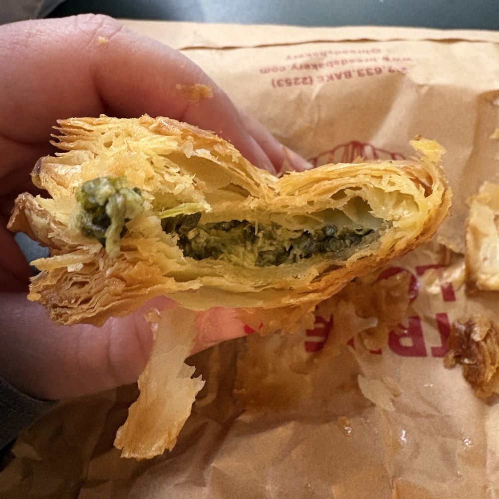 Breads Bakery - Upper West Side - Cross section spinach and Feta Bureka fresh out of the oven still warm - Coffee & Tea Near Me - New York, New York