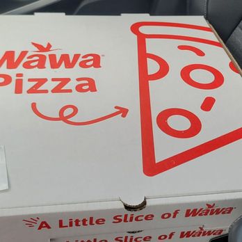 Wawa - a box of pizza sitting in the back seat of a car - Convenience Stores Near Me - North Port, Florida