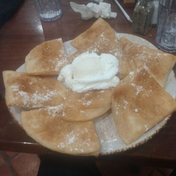 Nicha's Comida Mexicana - Delicious so papillas with vanilla ice cream and honey and cinnamon sprinkles and powdered sugar - Mexican Near Me - San Antonio, Texas