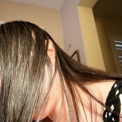 Rever Salon - This is my current after treatment. It used to look wet shiny even in the dark. now it looks like the back in normal light.