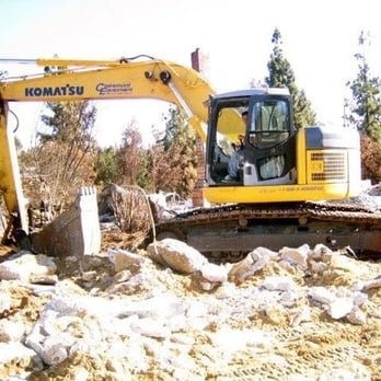 Big Build Construction - a large excavator working on a construction site - General Contractors Near Me