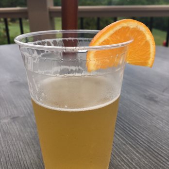 The River Tap & Grill - It's time for a beer on the deck! - American Near Me - Hollis, Maine