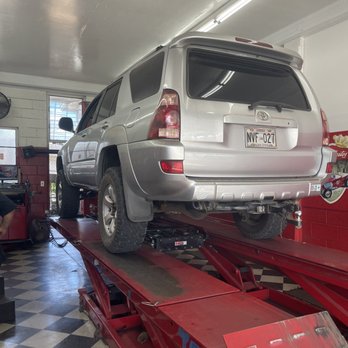 Scotty's Alignment & Brake Services - Car lift and service area. - Auto Repair Near Me - Pearl City, Hawaii Scotty's Alignment & Brake Services - Car lift and service area. - Auto Repair Near Me - Pearl City, Hawaii