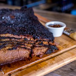 We don't play when it comes to our BBQ. We smoke our meats 6-12 hours over hickory wood. Try our deliciously slow-smoked brisket today.