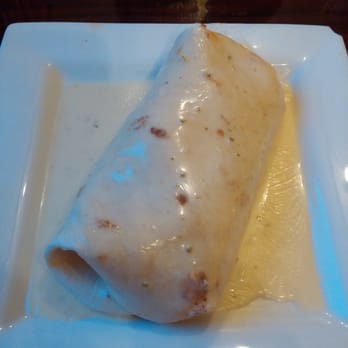Cantina Louie - My California burrito, covered in perfectly spicy queso! Freshly made, too. - Mexican Near Me - St. Augustine, Florida Cantina Louie - My California burrito, covered in perfectly spicy queso! Freshly made, too. - Mexican Near Me - St. Augustine, Florida