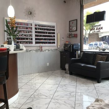 Tranquil Nail Spa & Skin Care - Waiting area with a very comfortable loveseat. Complimentary Tea and Coffee available! - Nail Salons Near Me - Orange, California Tranquil Nail Spa & Skin Care - Waiting area with a very comfortable loveseat. Complimentary Tea and Coffee available! - Nail Salons Near Me - Orange, California