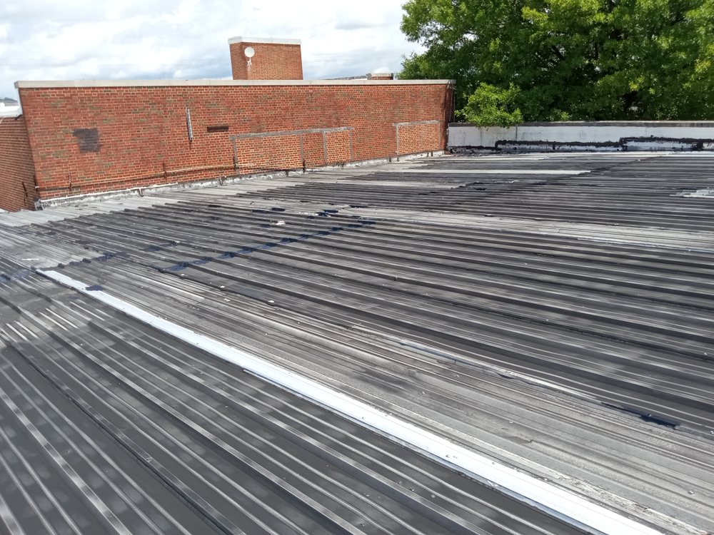 Slide of Taylor Made Roofing