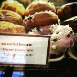 World Bean - "pearl necklace doughnut", topped with gooey glaze and other things.