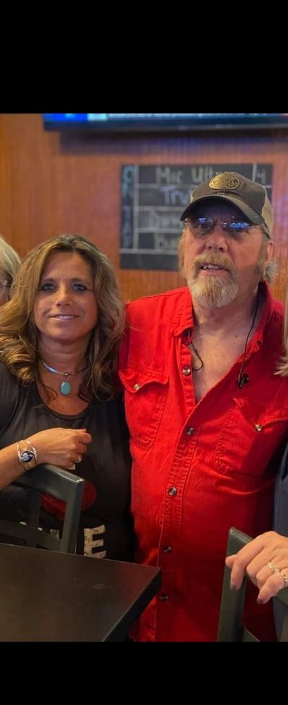 Uncle Tom's BarberShop Logo