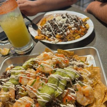 Sonora Grill - Surf and turf nachos and chilaquiles for Sunday football! - Mexican Near Me - Moreno Valley, California