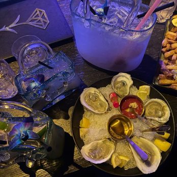 Carbon - Coco chanel purse, pradaloma, and I forgot the name of the other one with oysters - Italian Near Me - Chicago, Illinois