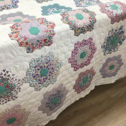 The Quilter's Corner - Grandmothers Flower Garden. A customer quilt I quilted.