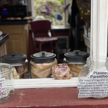 The Beachside Buzz - a window with a sign and jars of food - Coffee & Tea Near Me - Waldport, Oregon The Beachside Buzz - a window with a sign and jars of food - Coffee & Tea Near Me - Waldport, Oregon