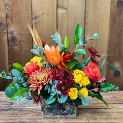 Ballard Blossom - Fall flowers in birch vessel, lilies, spray roses, mums and lush greens. A loose natural looking autumn flower bouquet.