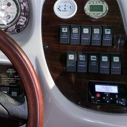 Jim's Car Audio & Alarm - New control panel of Clarion audio system installed in chaparral pleasure boat