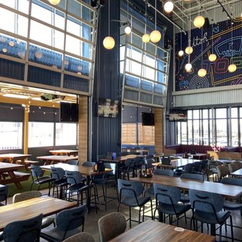Topgolf - tables and chairs in a restaurant - Golf Near Me - Vineyard, Utah