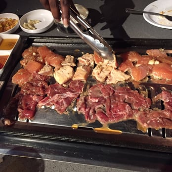AYCE Gogi - VAN NUYS - Bulgogi & rosemary chicken on the grill...very good - Korean Near Me - Van Nuys, California